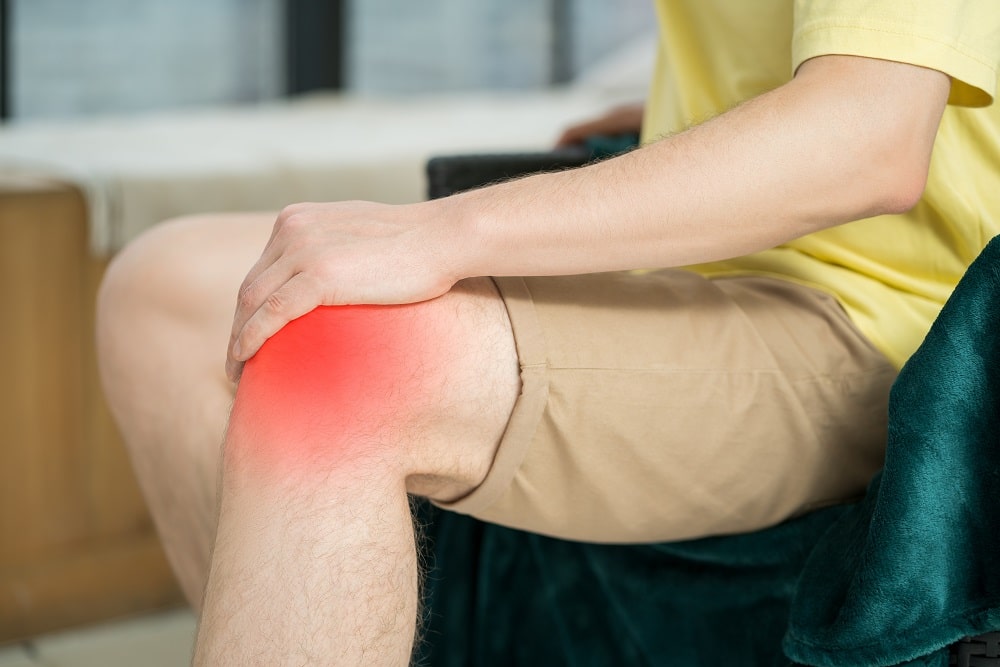 Knee,Pain,,Man,Suffering,From,Ache,And,Doing,Self massage,At