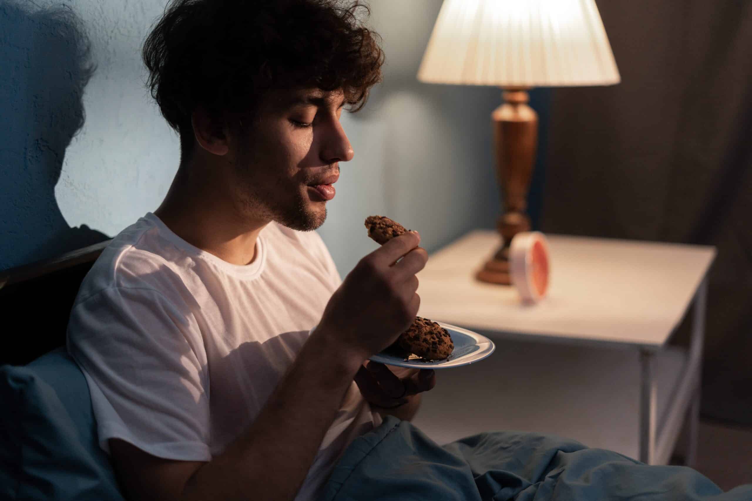 Stressed,Young,Man,Having,A,Cookies,At,Night.,Unhappy,Tired
