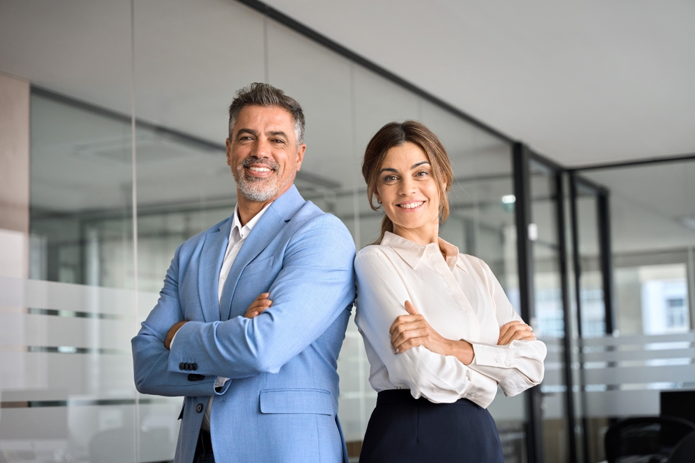 Two,Happy,Executive,Managers,,Mature,Business,Man,And,Woman,Leaders,